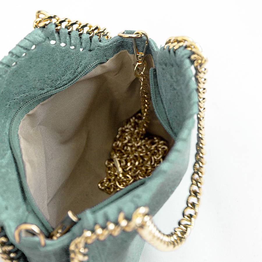 Laura Di Maggio LUMI – Borsa con catene in pelle vintage menta Consegna Veloce
