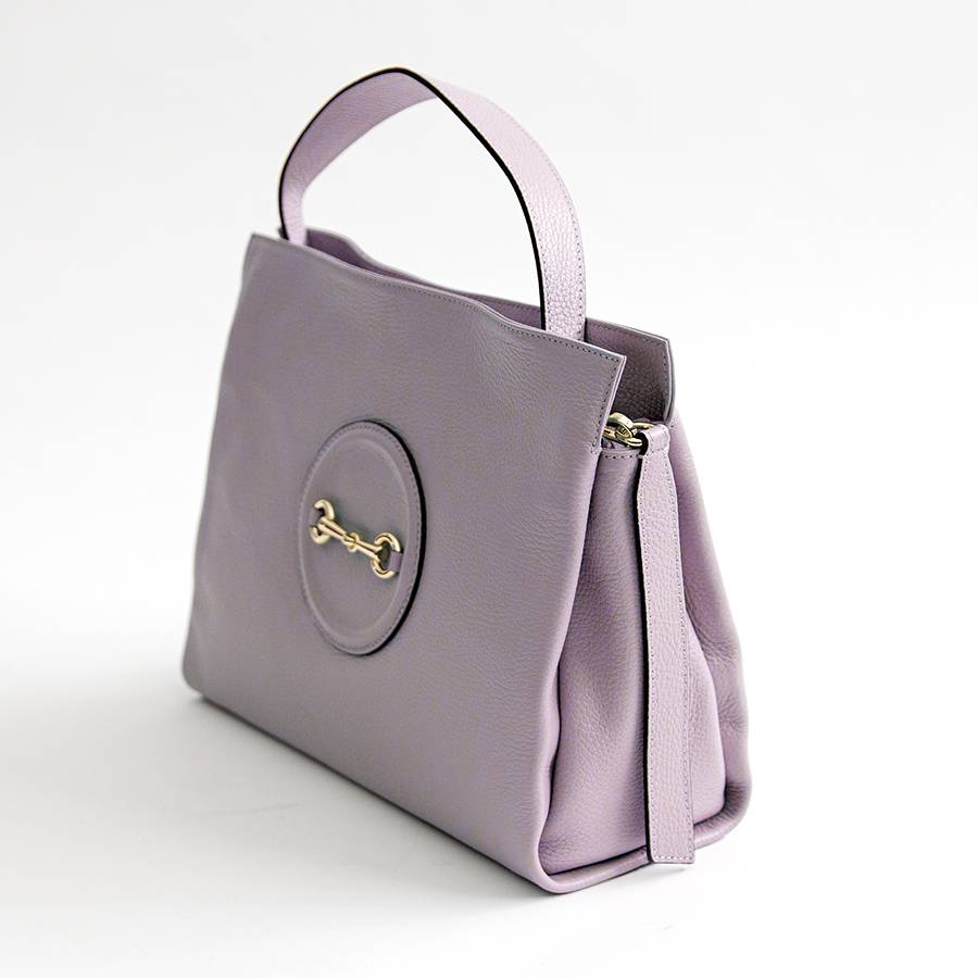 Laura Di Maggio NAIA – borsa con morsetto in pelle lilla Acquista Ora