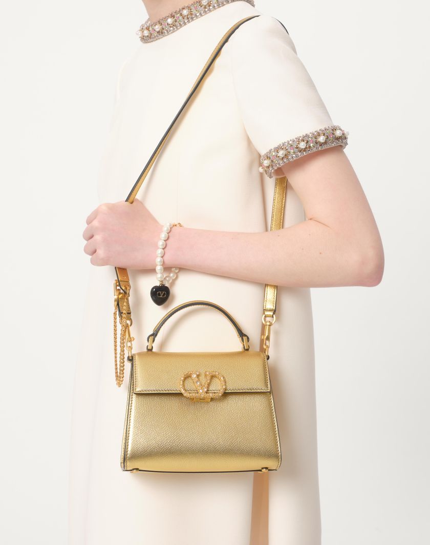 Valentino Handbags Borsa A Mano Mini Valentino Garavani Vsling In Vitello Granato Laminato Con Logo Gioiello per Donna in Antique Brass | Valentino IT Prezzo Ridotto