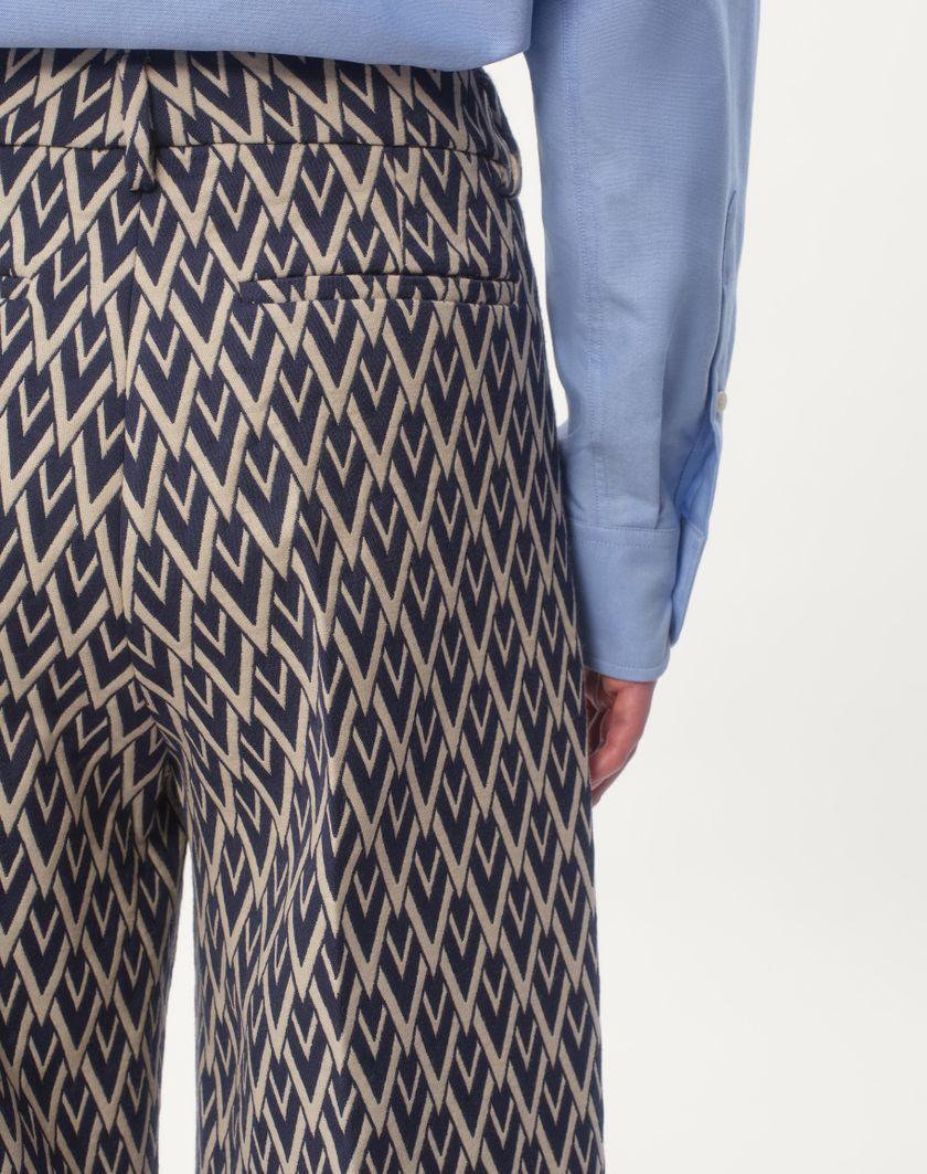 Valentino Handbags Pantalone In Lana Con Risvolto Con Motivo Jacquard Toute La V per Uomo in Notte/crema | Valentino IT Nuovo