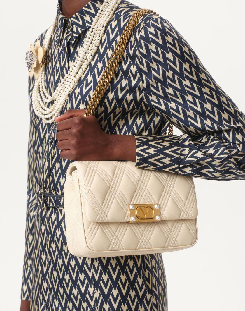 Valentino Handbags Camicia In Twill Toute La V per Donna in Nero/avorio | Valentino IT 2025